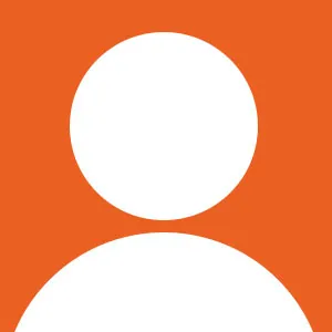 Ein allgemeines Benutzerprofil-Symbol mit einer weißen Silhouette von Kopf und Schultern auf festem orangem Hintergrund.